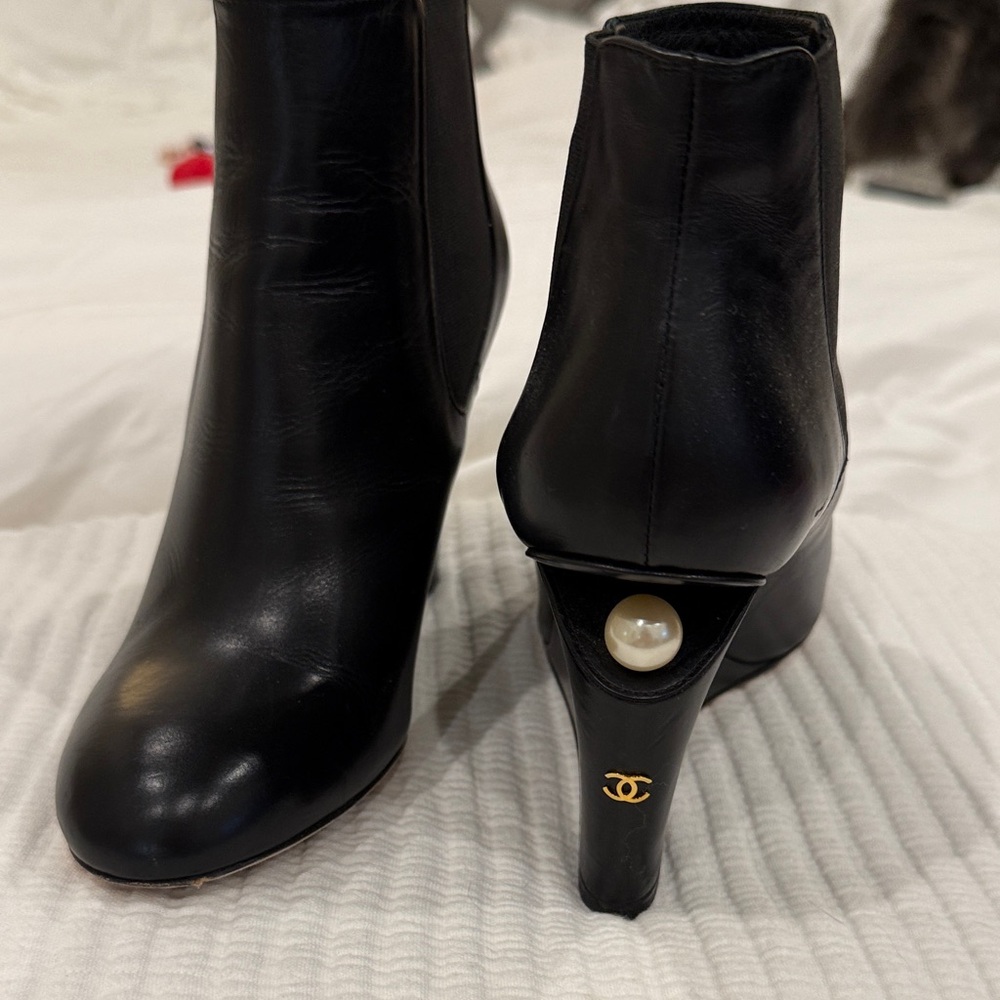 CHANEL Elegant Black Boots with Pearl Detail